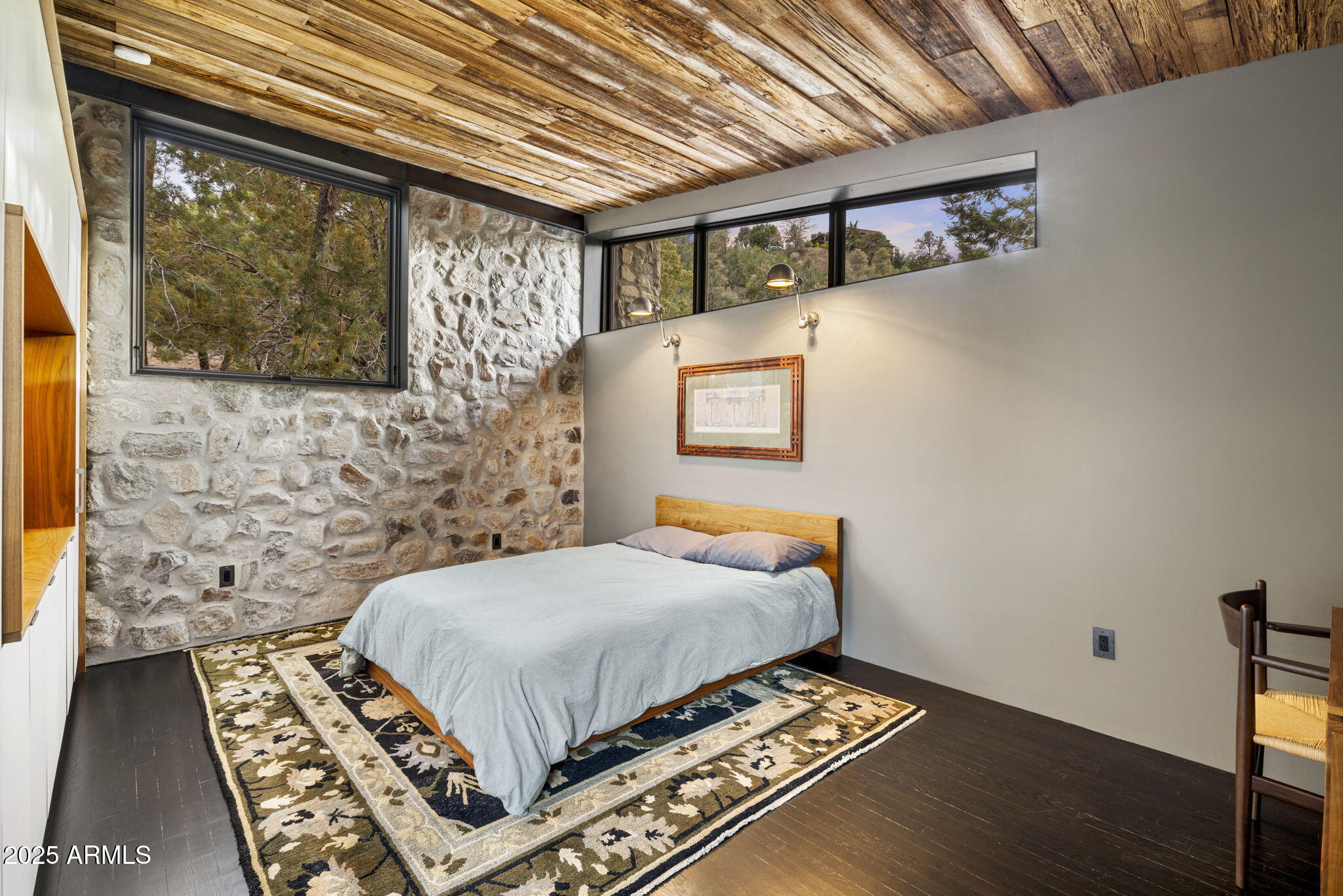 51 Rill Road Prescott, AZ 86305 - Photo 59 of 89 a bedroom with a bed and wooden floor