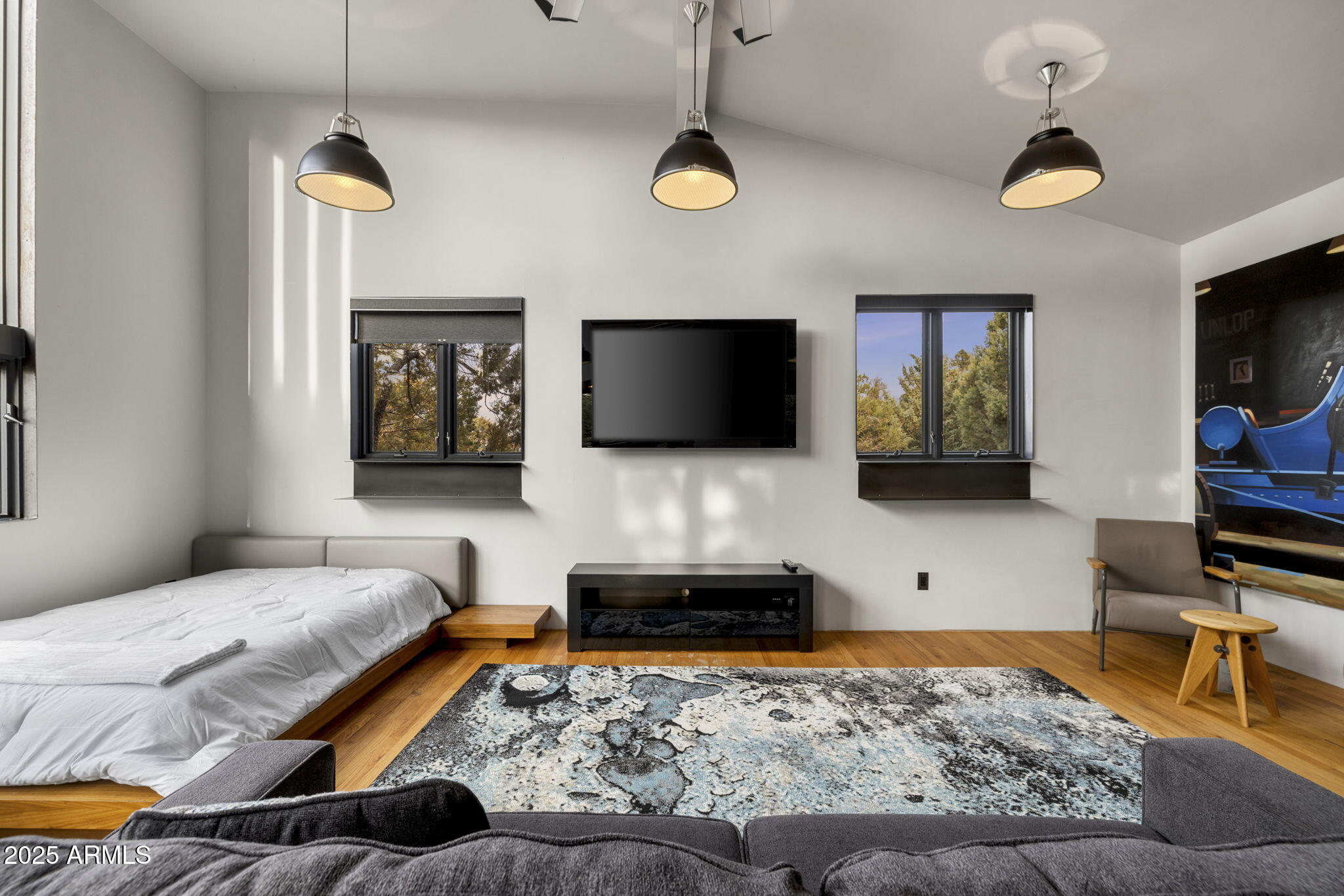 51 Rill Road Prescott, AZ 86305 - Photo 74 of 89 a bedroom with a bed and a flat screen tv