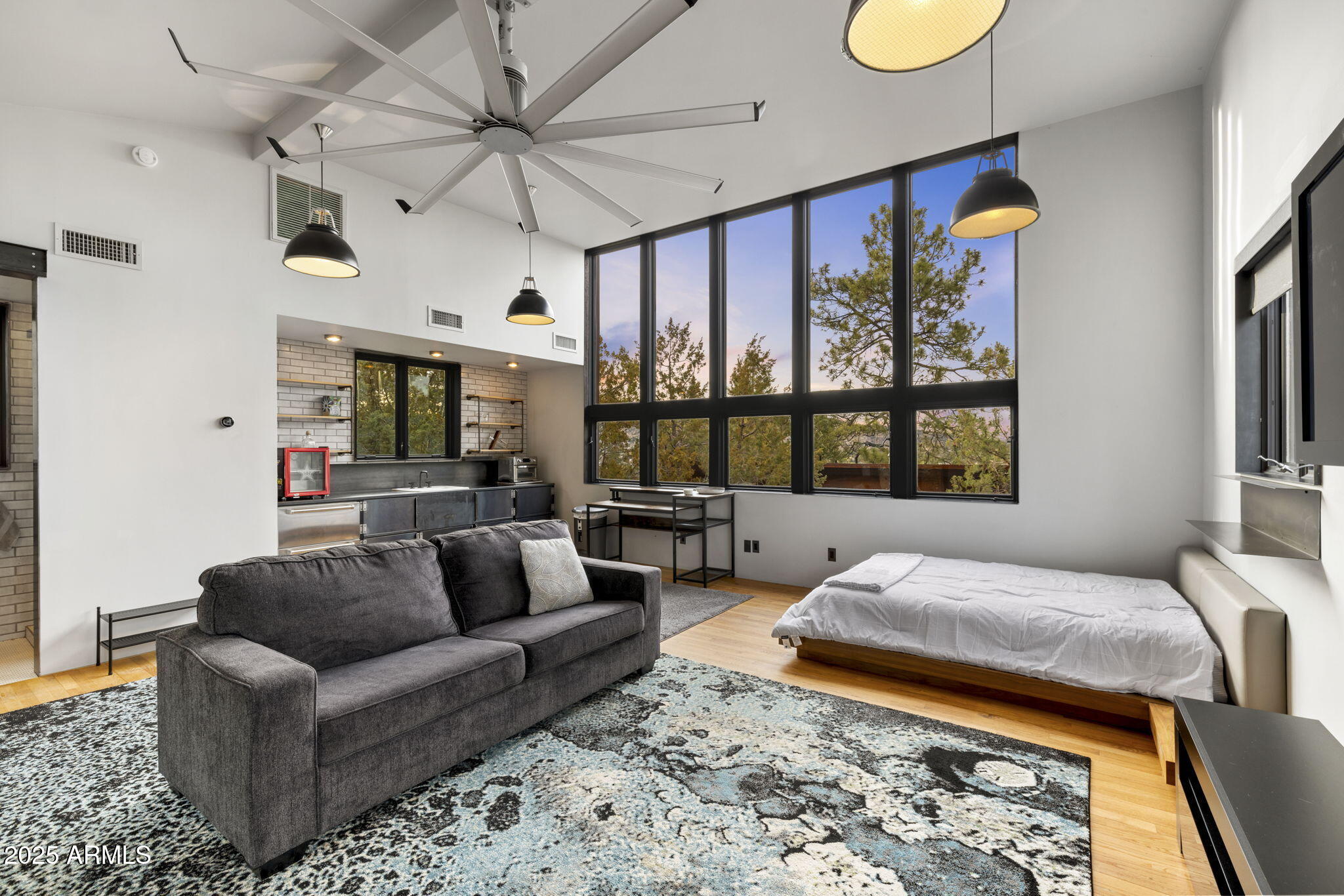 51 Rill Road Prescott, AZ 86305 - Photo 75 of 89 a living room with furniture fireplace and a large window