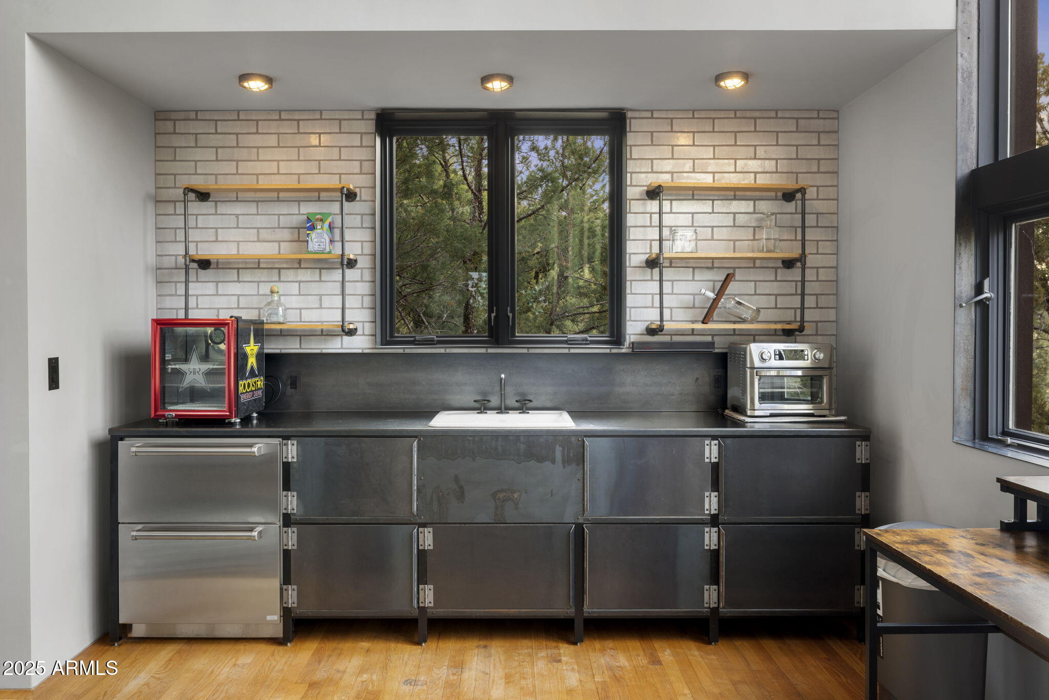 51 Rill Road Prescott, AZ 86305 - Photo 77 of 89 a kitchen with stainless steel appliances granite countertop a refrigerator and a sink