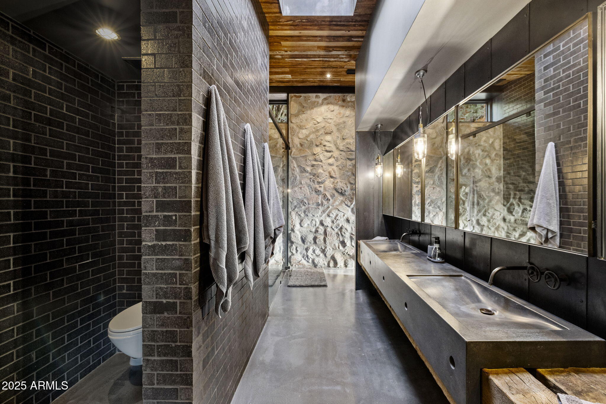 51 Rill Road Prescott, AZ 86305 - Photo 8 of 89 a bathroom with a sink a large mirror and a shower