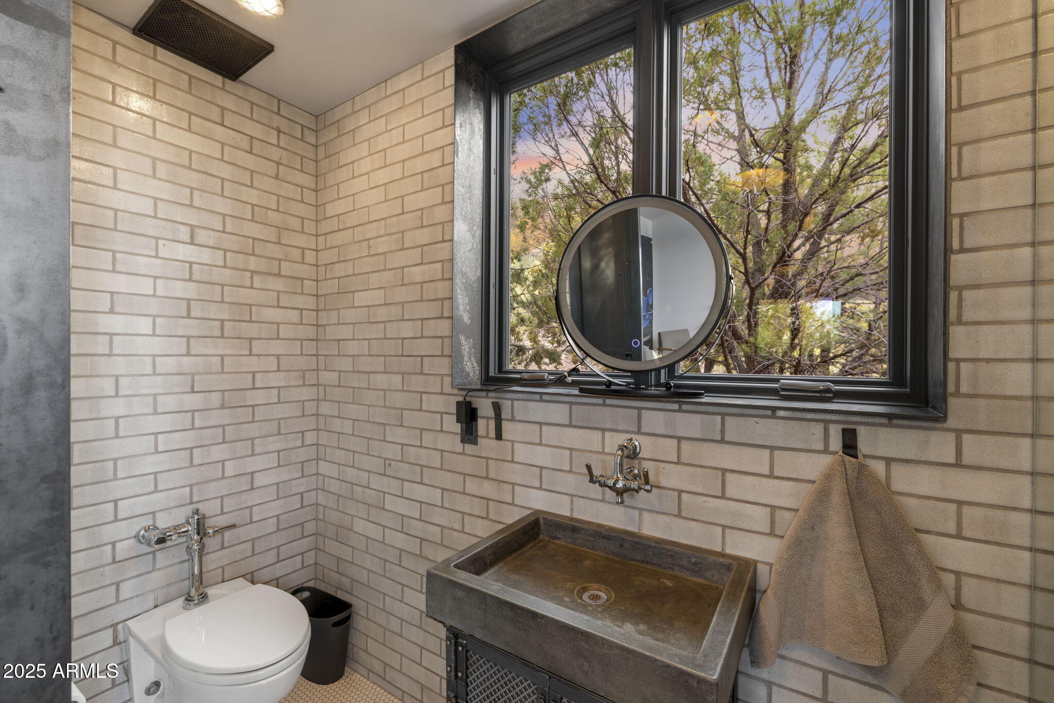 51 Rill Road Prescott, AZ 86305 - Photo 81 of 89 a bathroom with a toilet sink and mirror
