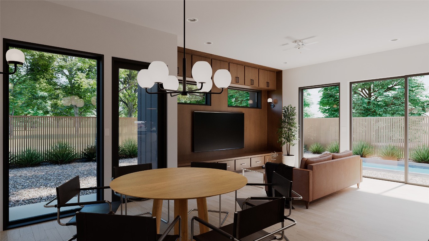 205 Medina Street, Unit 1 Austin, TX 78702 - Photo 5 of 15 Dining space featuring light wood-style flooring, a chandelier, and recessed lighting