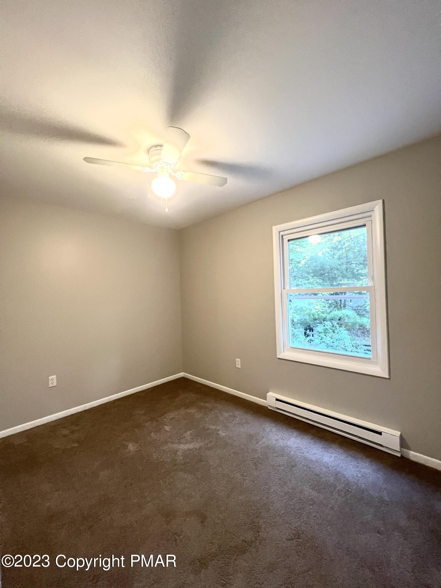 179 Gold Finch Road Bushkill, PA 18324 - Photo 8 of 15 an empty room with a window