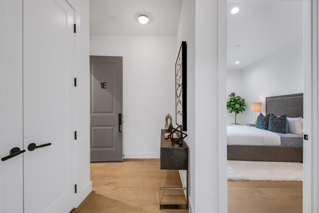 3601 Routh Street, Unit 2E Dallas, TX 75219 - Photo 7 of 14 Corridor featuring baseboards, light wood-type flooring, and recessed lighting