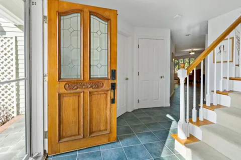 a view of front door with hallway