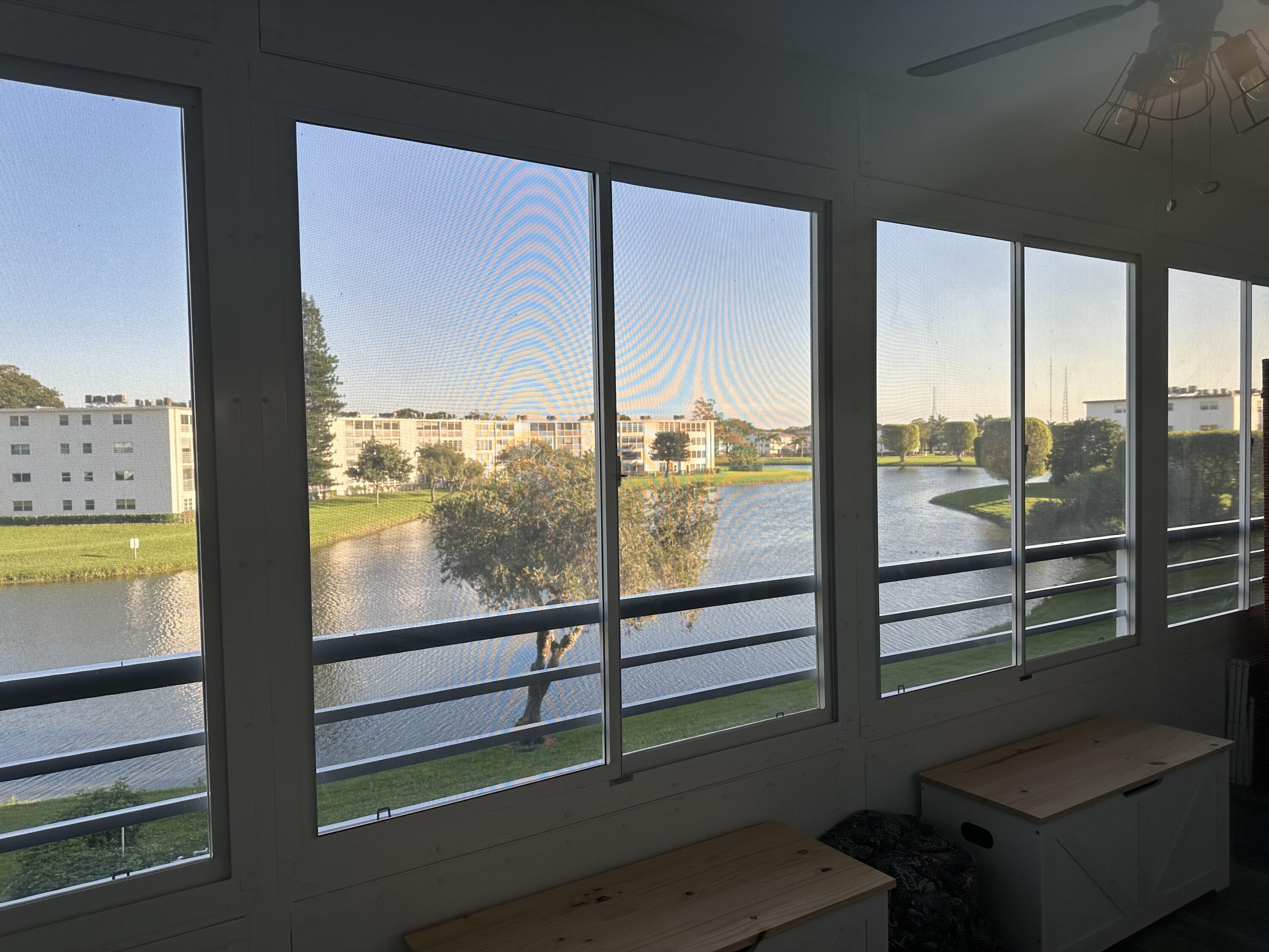 3030 Guildford East, Unit 3030 Boca Raton, FL 33434 - Photo 16 of 18 Lanai-Lake view