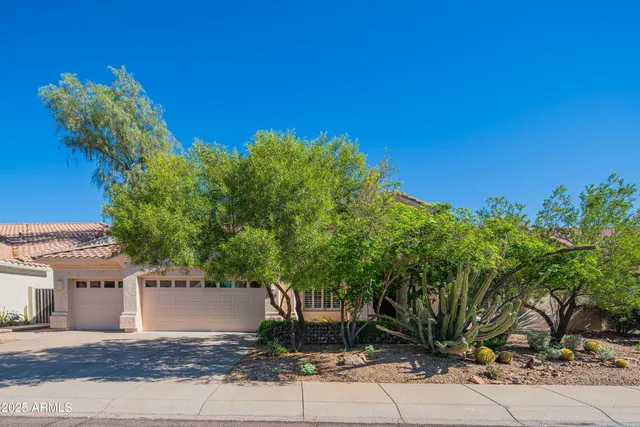 a view of a street with a building in the background