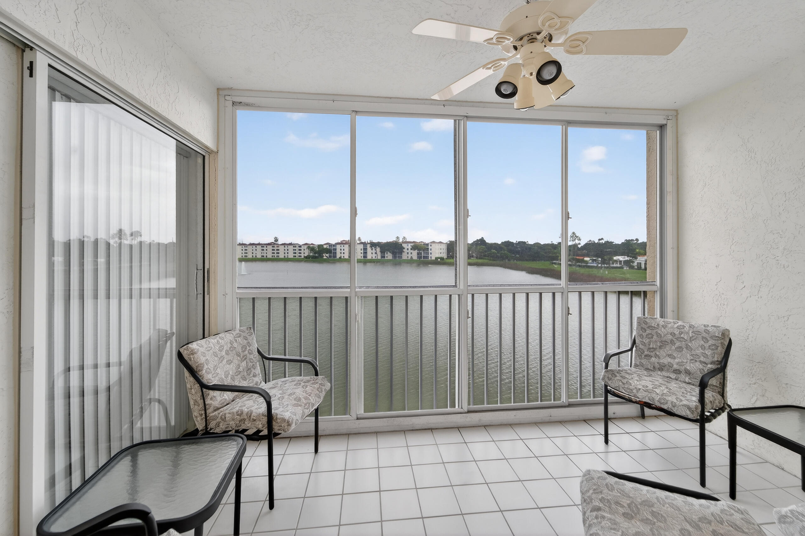 14112 Huntington Pointe Drive, Unit 309 Delray Beach, FL 33484 - Photo 14 of 50 a view of a chairs in balcony