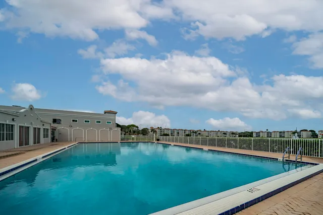 a view of a swimming pool and lake view