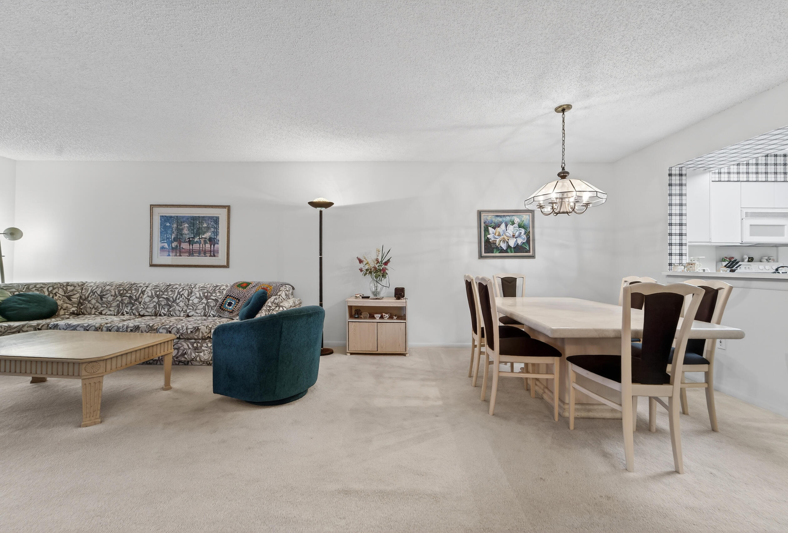 14112 Huntington Pointe Drive, Unit 309 Delray Beach, FL 33484 - Photo 9 of 50 a view of a dining room with furniture