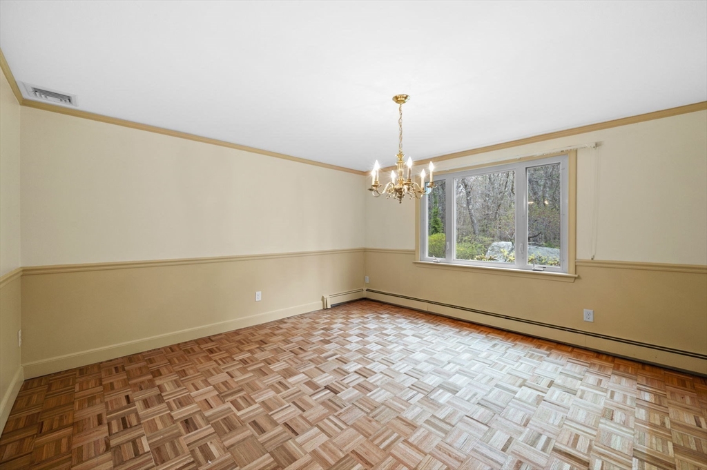 46 Georgetown Road Boxford, MA 01921 - Photo 20 of 40 a view of an empty room with a window