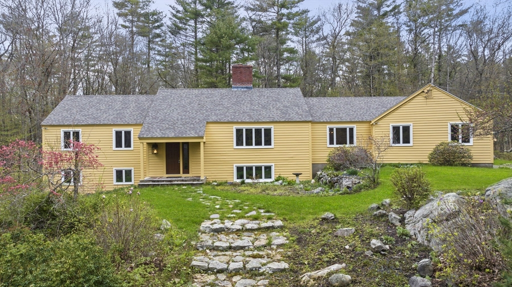 46 Georgetown Road Boxford, MA 01921 - Photo 2 of 40 a front view of a house with a yard