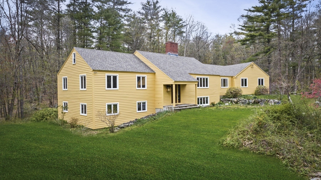 46 Georgetown Road Boxford, MA 01921 - Photo 3 of 40 a view of a house with a yard and sitting area