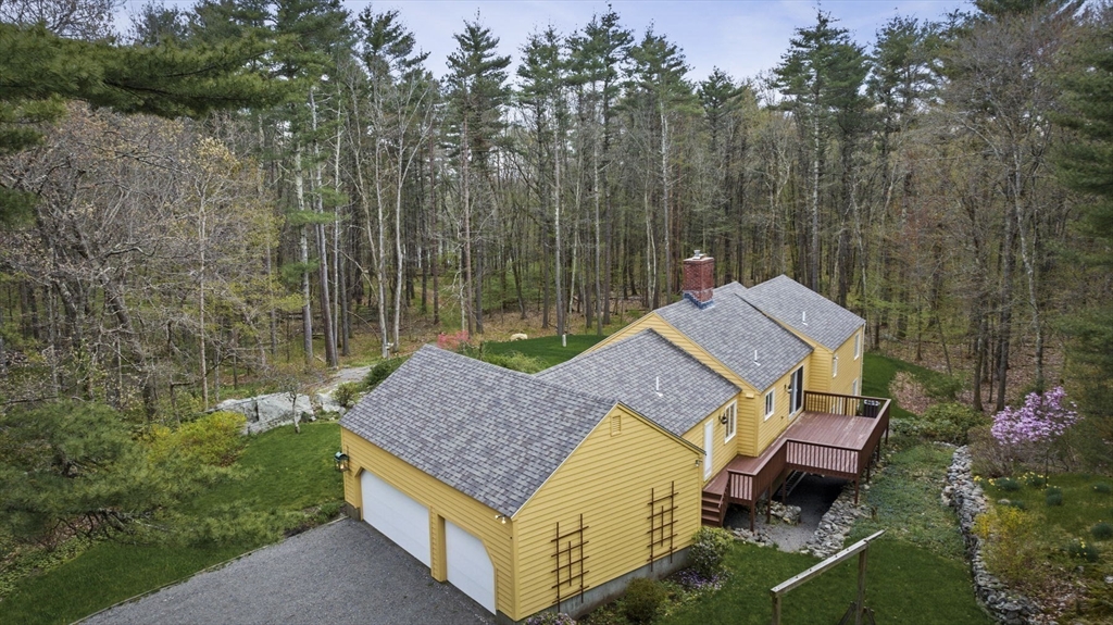 46 Georgetown Road Boxford, MA 01921 - Photo 5 of 40 a aerial view of a house with a yard and a swimming pool