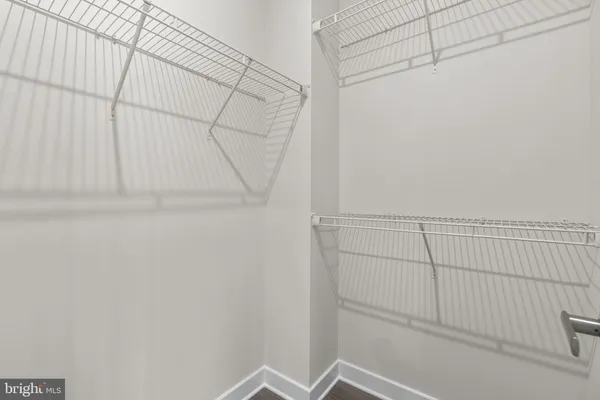 a view of small space with racks on the wall