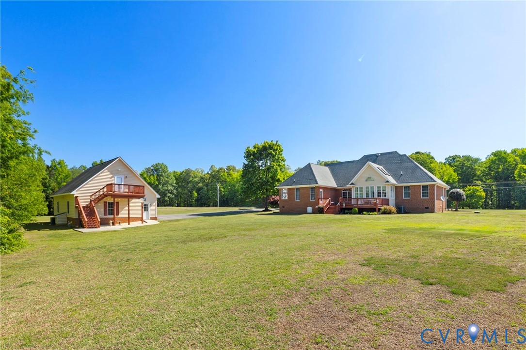 15441 Goshen Road Montpelier, VA 23192 - Photo 8 of 47 a house with garden in front of it