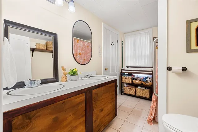 a bed room with a bed and a table