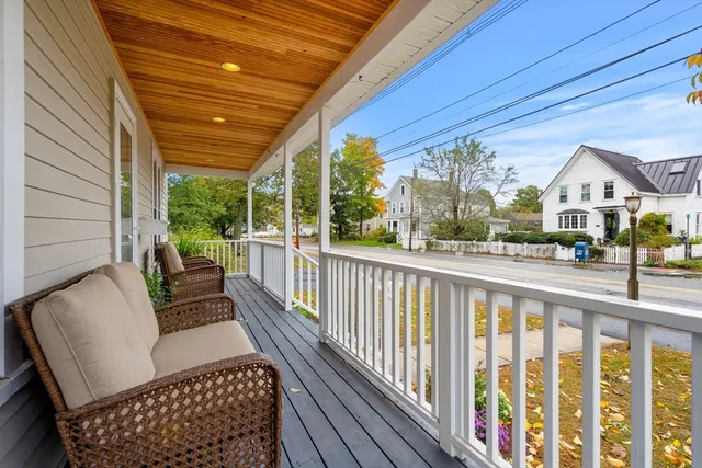 a view of balcony with furniture