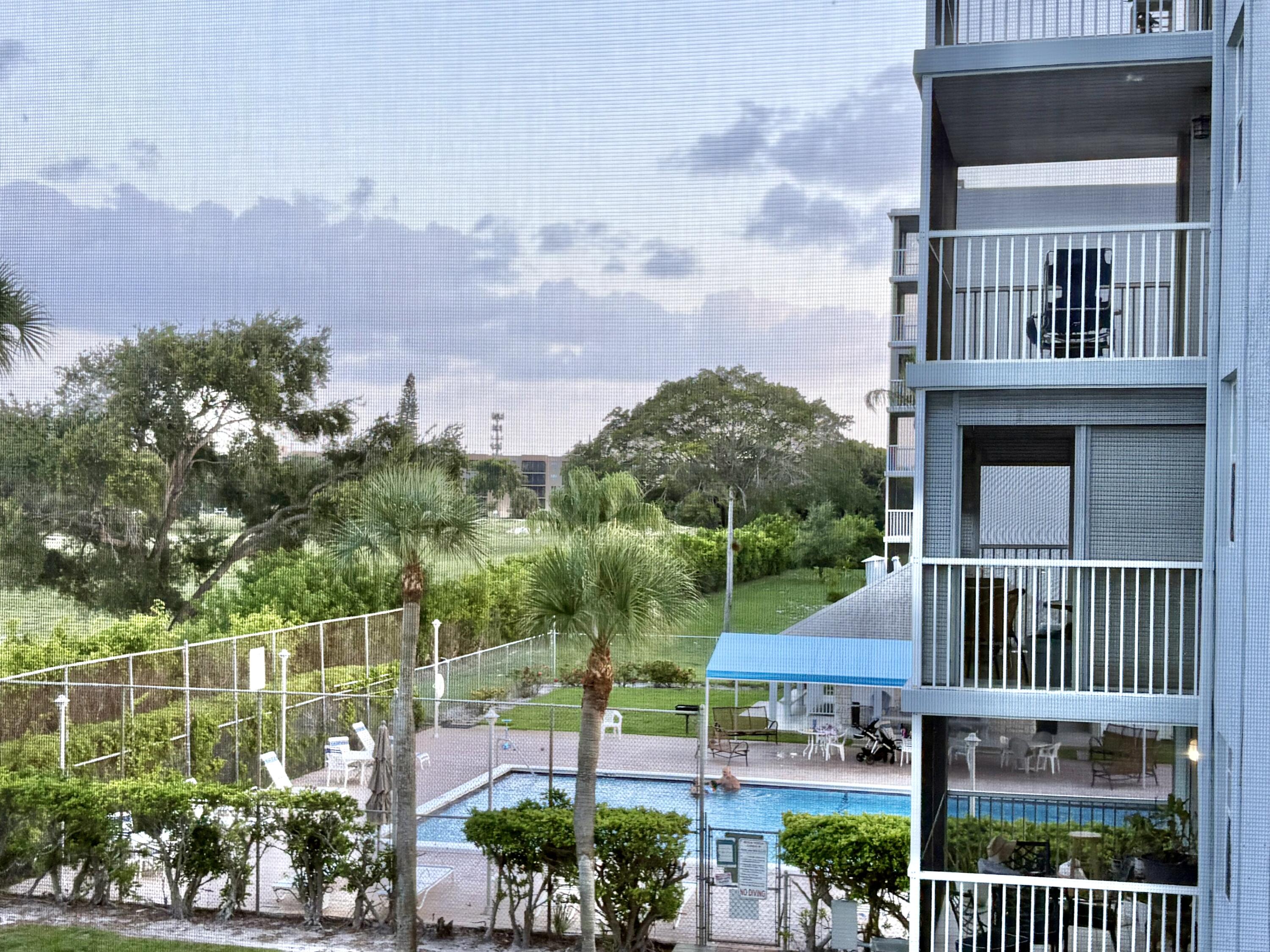 5700 Northwest 2nd Avenue, Unit 311 Boca Raton, FL 33487 - Photo 14 of 33 BALCONY TO POOL VIEW