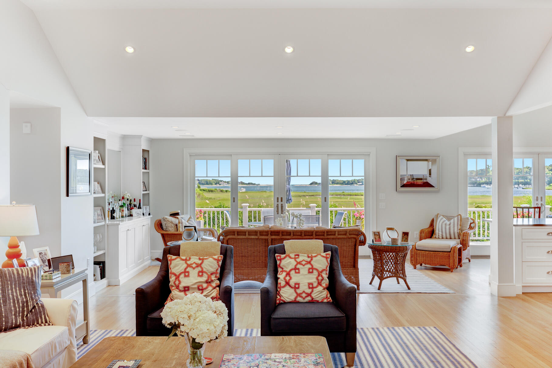 28 Bayview Road Osterville, MA 02655 - Photo 8 of 42 a living room with furniture and large windows