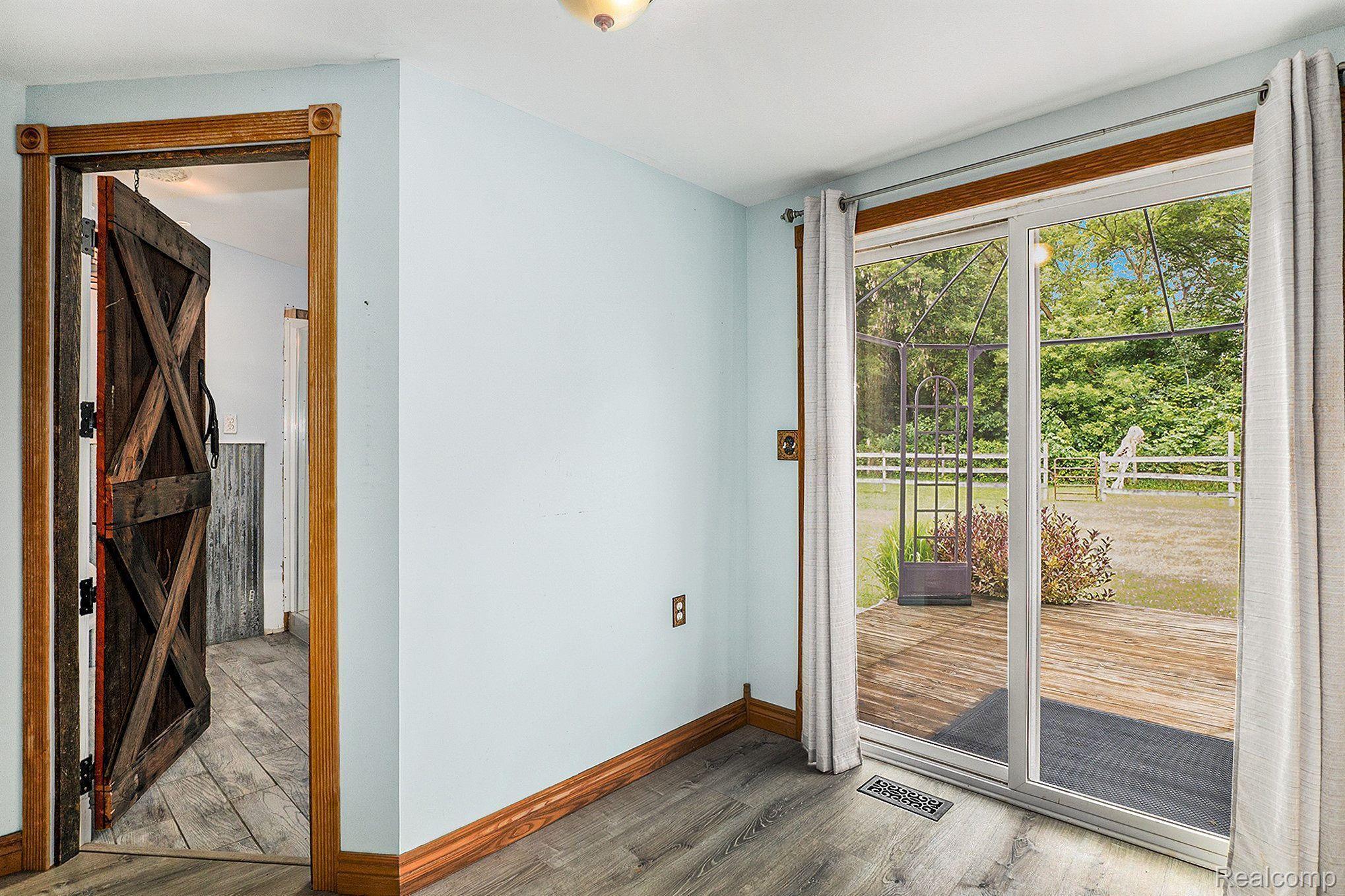 1950 South Lake George Road Attica, MI 48412 - Photo 14 of 30 Oversized Mudroom off Back Deck