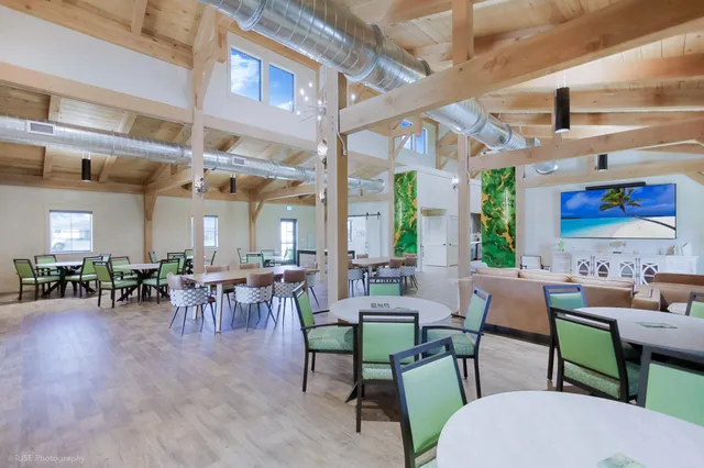 a front view of a hall with dining area