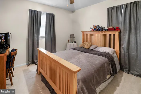 a bedroom with a bed and a closet