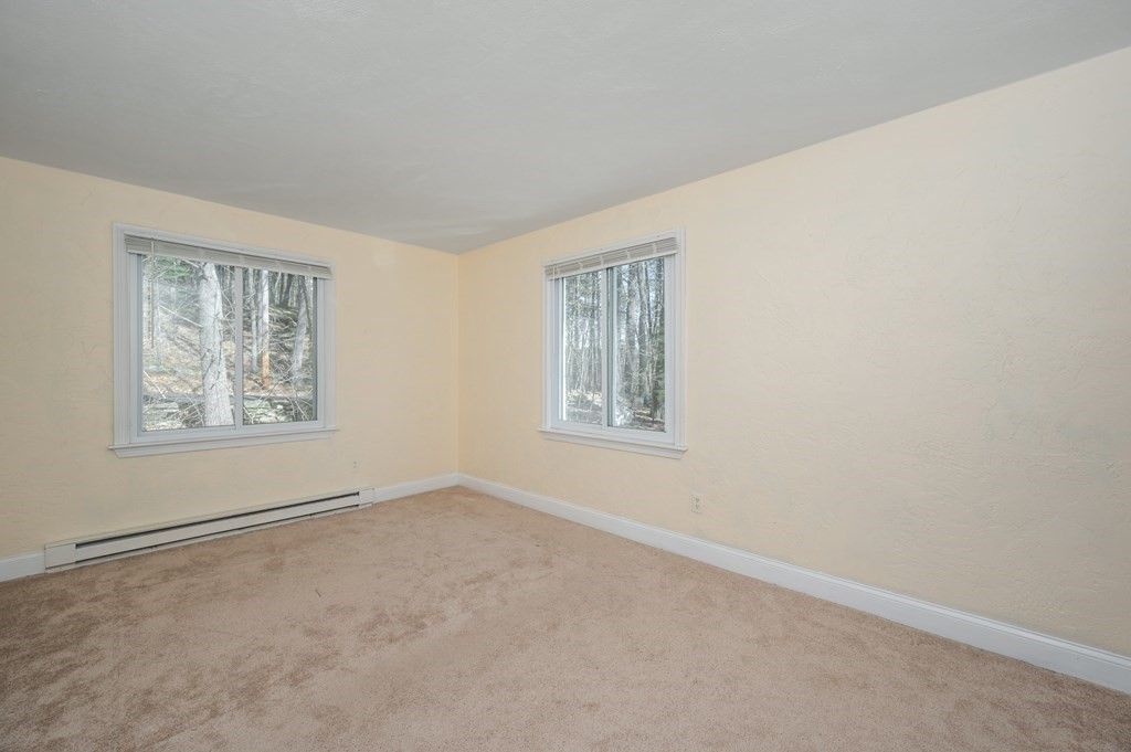 300 Swanson Road, Unit 218 Boxborough, MA 01719 - Photo 16 of 23 an empty room with windows