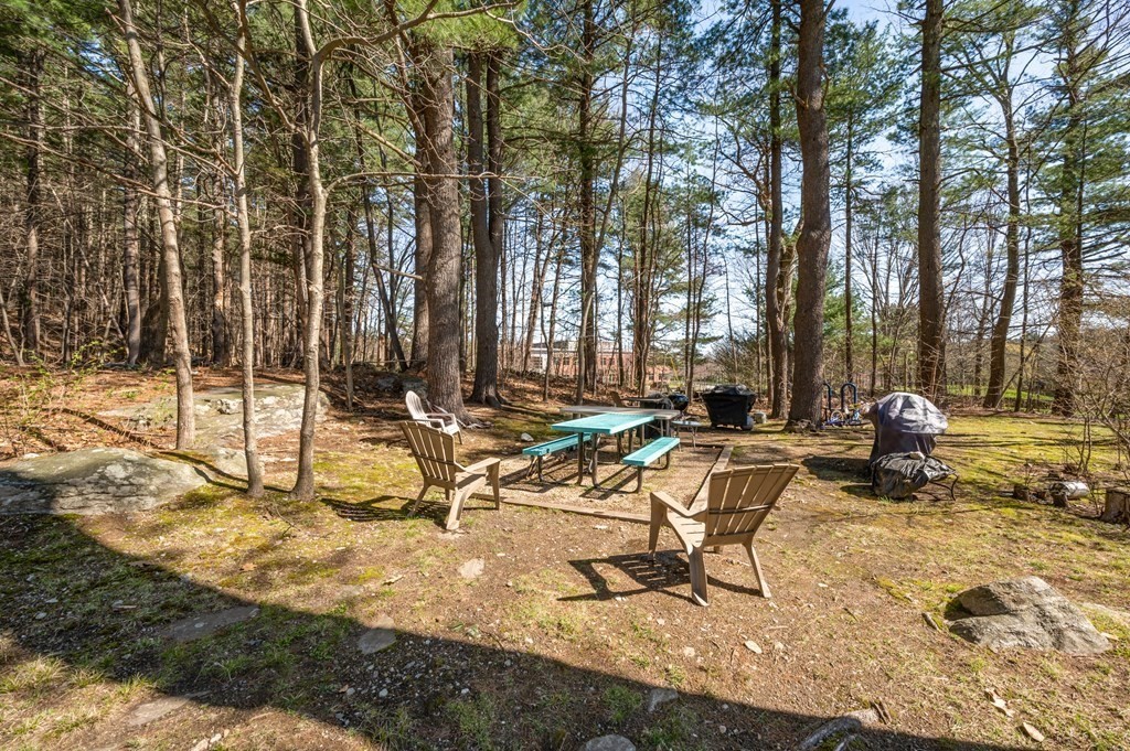 300 Swanson Road, Unit 218 Boxborough, MA 01719 - Photo 22 of 23 a view of a park with swings and slides