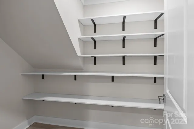 a view of an empty walk in closet