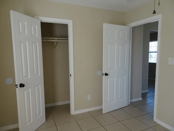 a kitchen with a sink and a stove