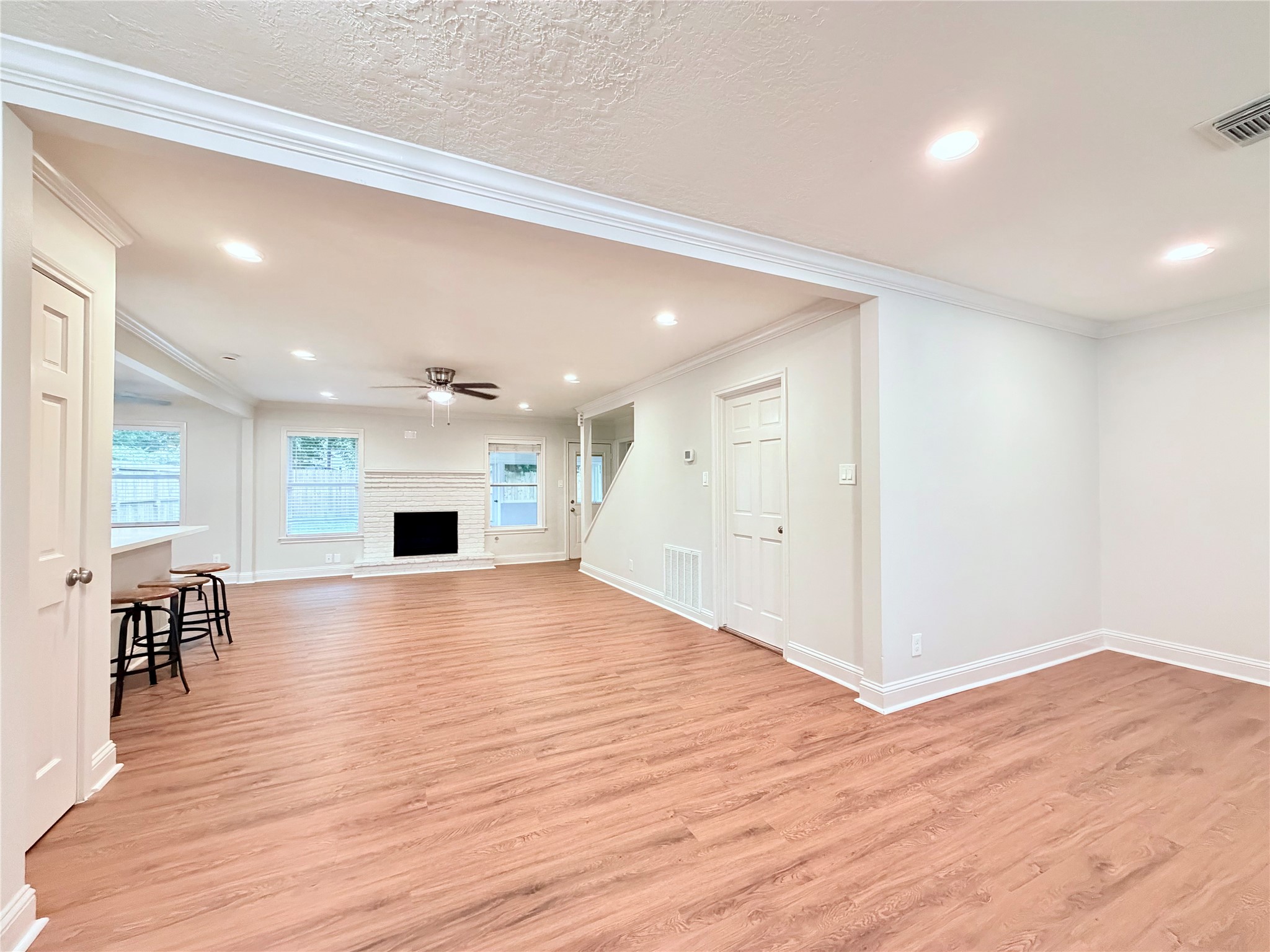 3319 Springrock Lane Houston, TX 77080 - Photo 10 of 38 Open living room plan with gas fireplace