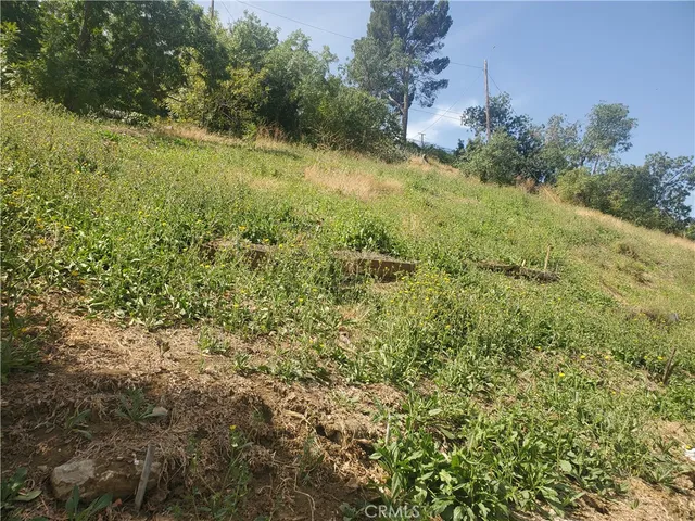 a view of a street with cars