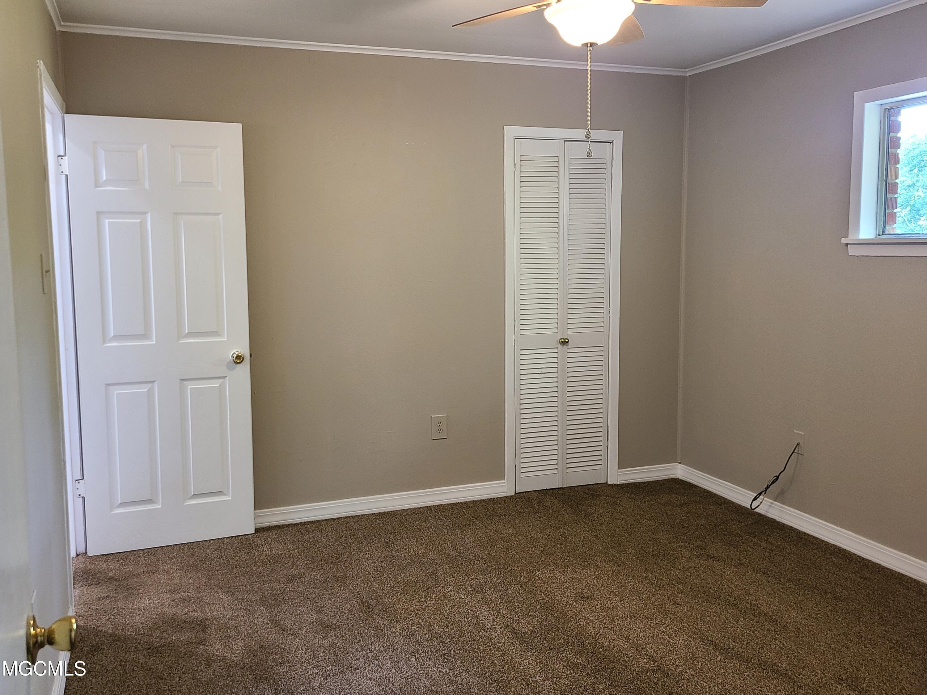 245 Reinike Road Long Beach, MS 39560 - Photo 16 of 25 Middle Bedroom