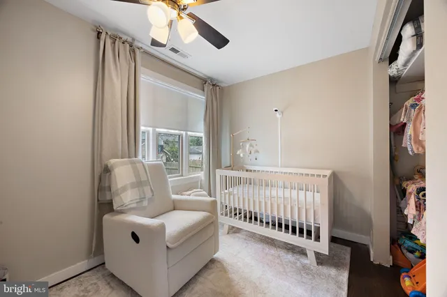 a bedroom with furniture and a window