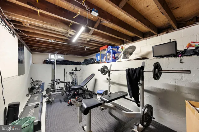 a view of gym equipment and windows