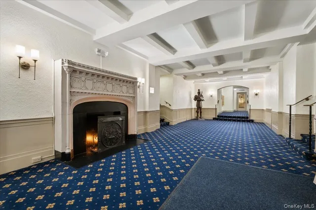 a bedroom with a bed and a fireplace