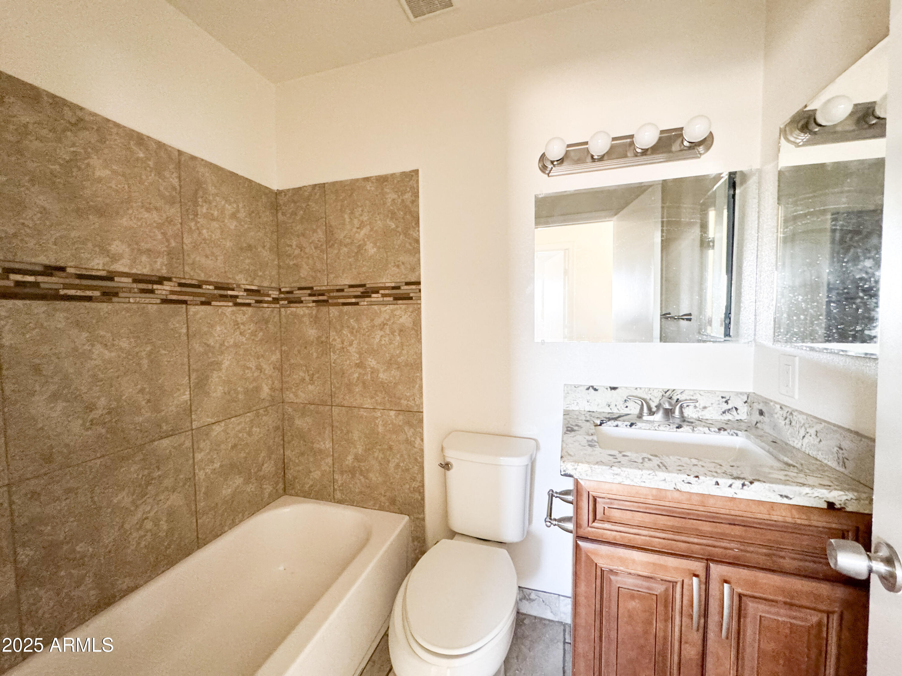 2739 West Rancho Drive Phoenix, AZ 85017 - Photo 16 of 33 a bathroom with a sink a toilet and shower