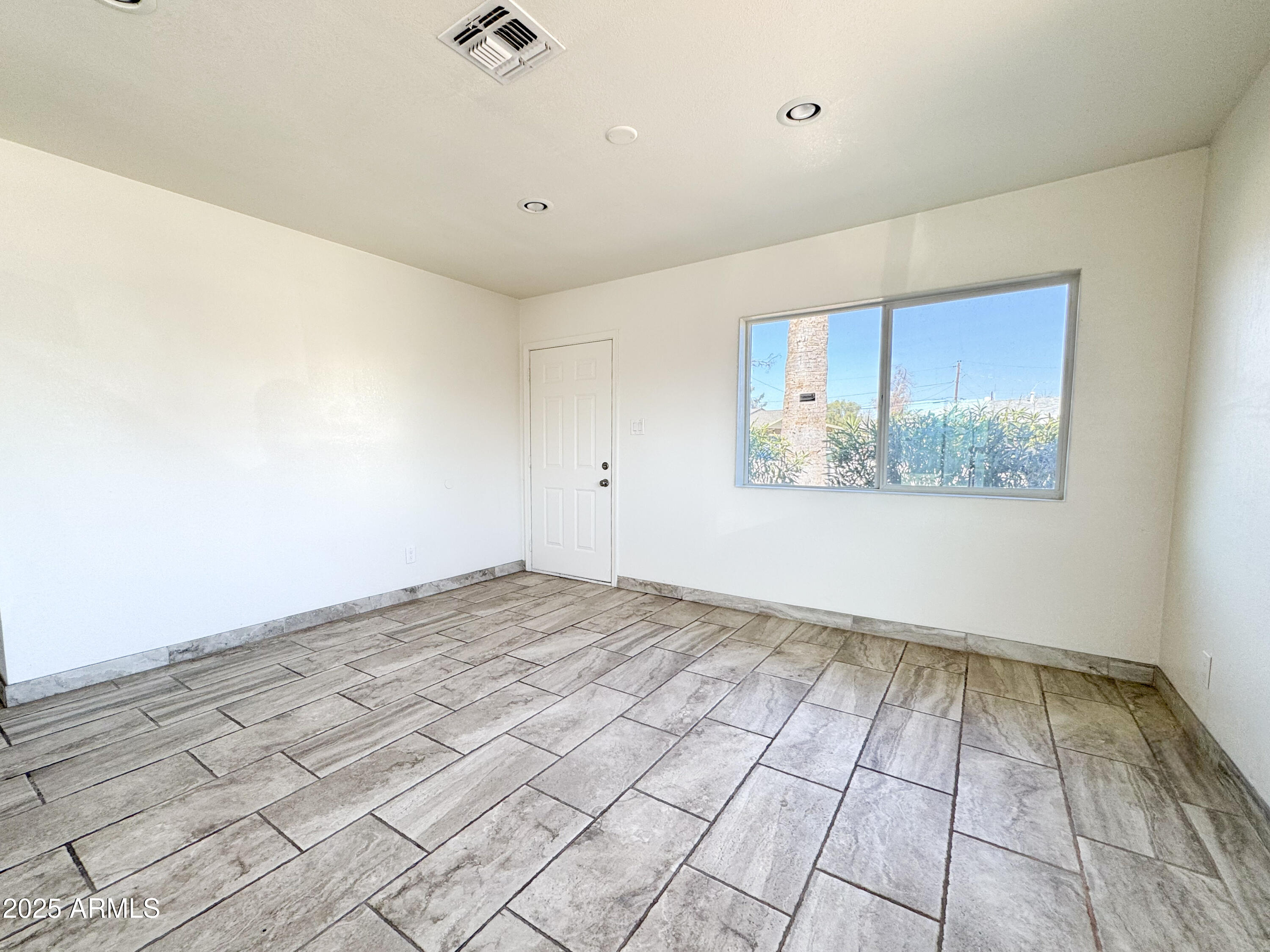 2739 West Rancho Drive Phoenix, AZ 85017 - Photo 5 of 33 a view of an empty room