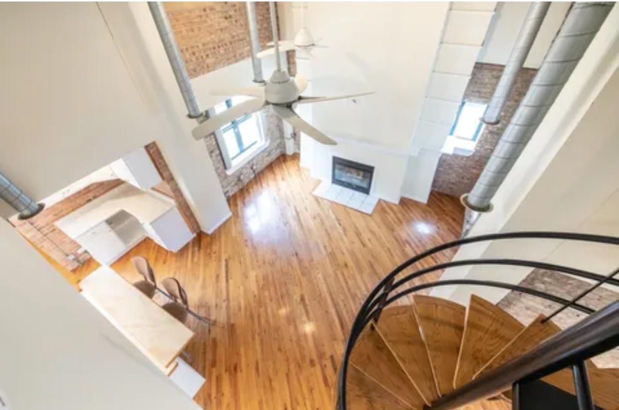 1439 South Michigan Avenue, Unit 101 Chicago, IL 60605 - Photo 8 of 14 a view of an entryway with wooden floor