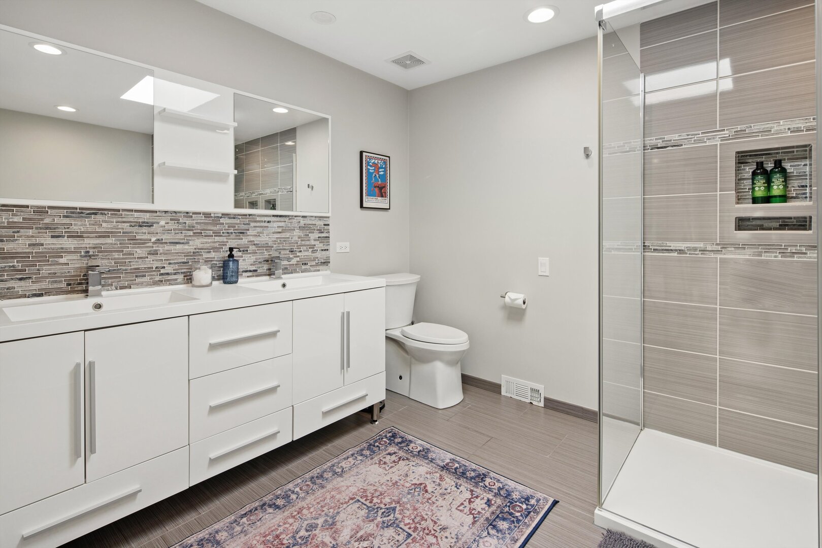 2222 North Racine Avenue, Unit 16 Chicago, IL 60614 - Photo 27 of 32 a bathroom with a sink a toilet and shower