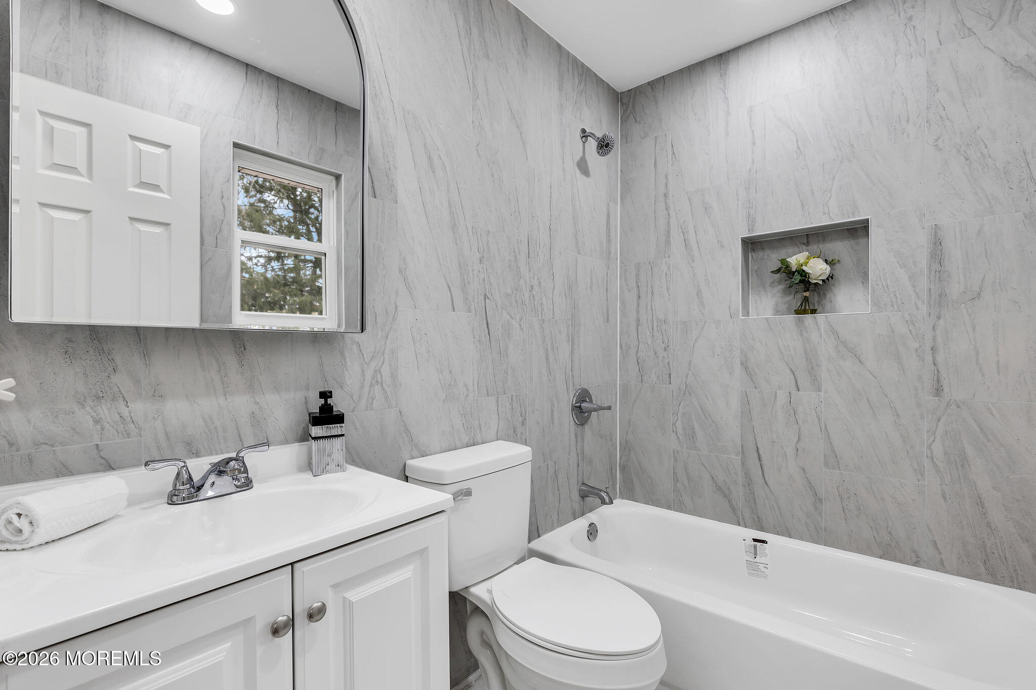 50 Westbrook Road Howell, NJ 07731 - Photo 38 of 73 a bathroom with a sink a toilet and shower