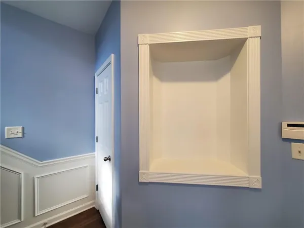 a view of hallway with washer and dryer