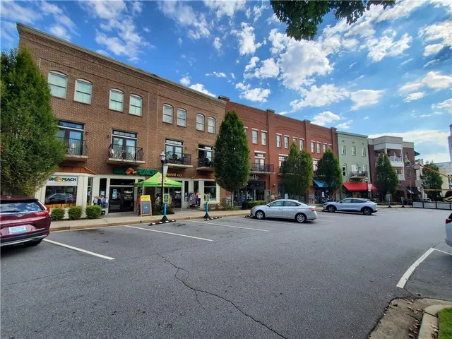 a view of a street with cars