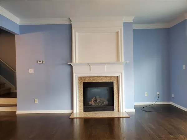 a living room with a fireplace