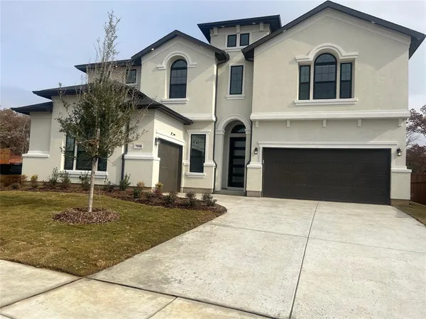 a house view with a outdoor space