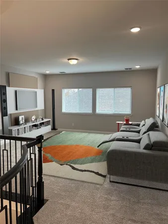 a bedroom with a bed and a table in it