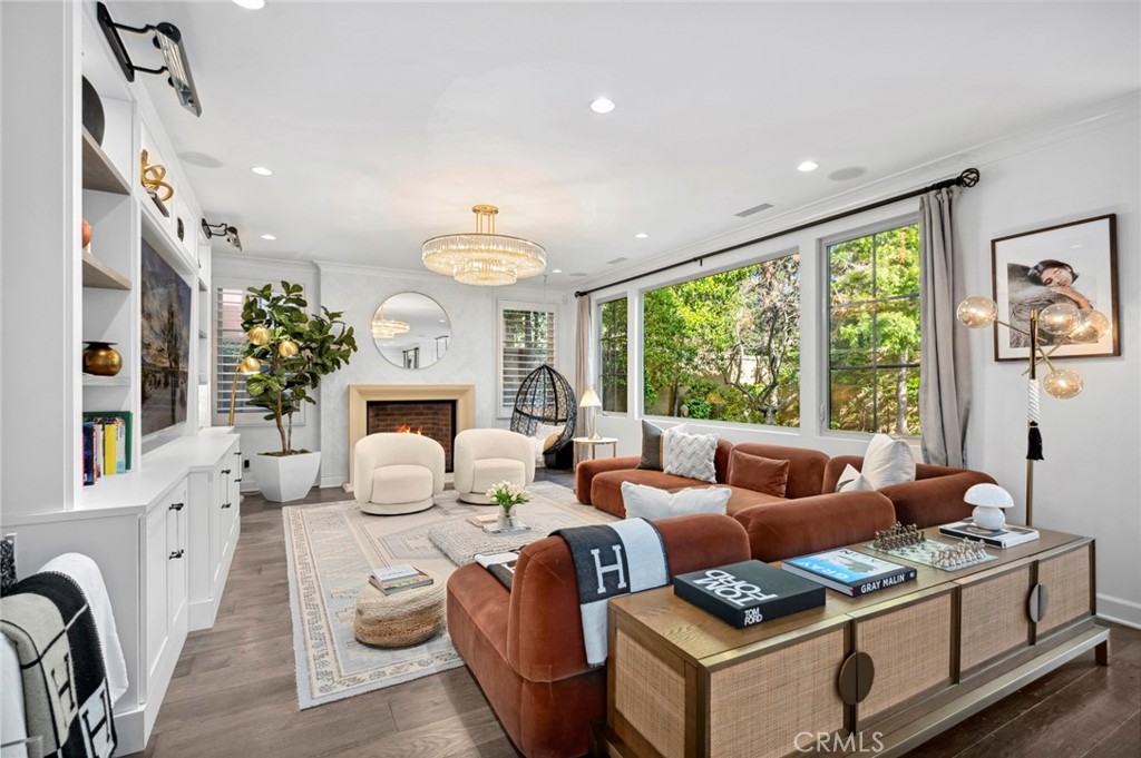 24 Tesoro Irvine, CA 92618 - Photo 12 of 75 a living room with furniture fireplace and a large window