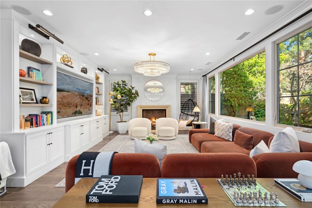 24 Tesoro Irvine, CA 92618 - Photo 13 of 75 a living room with furniture a rug and a large window